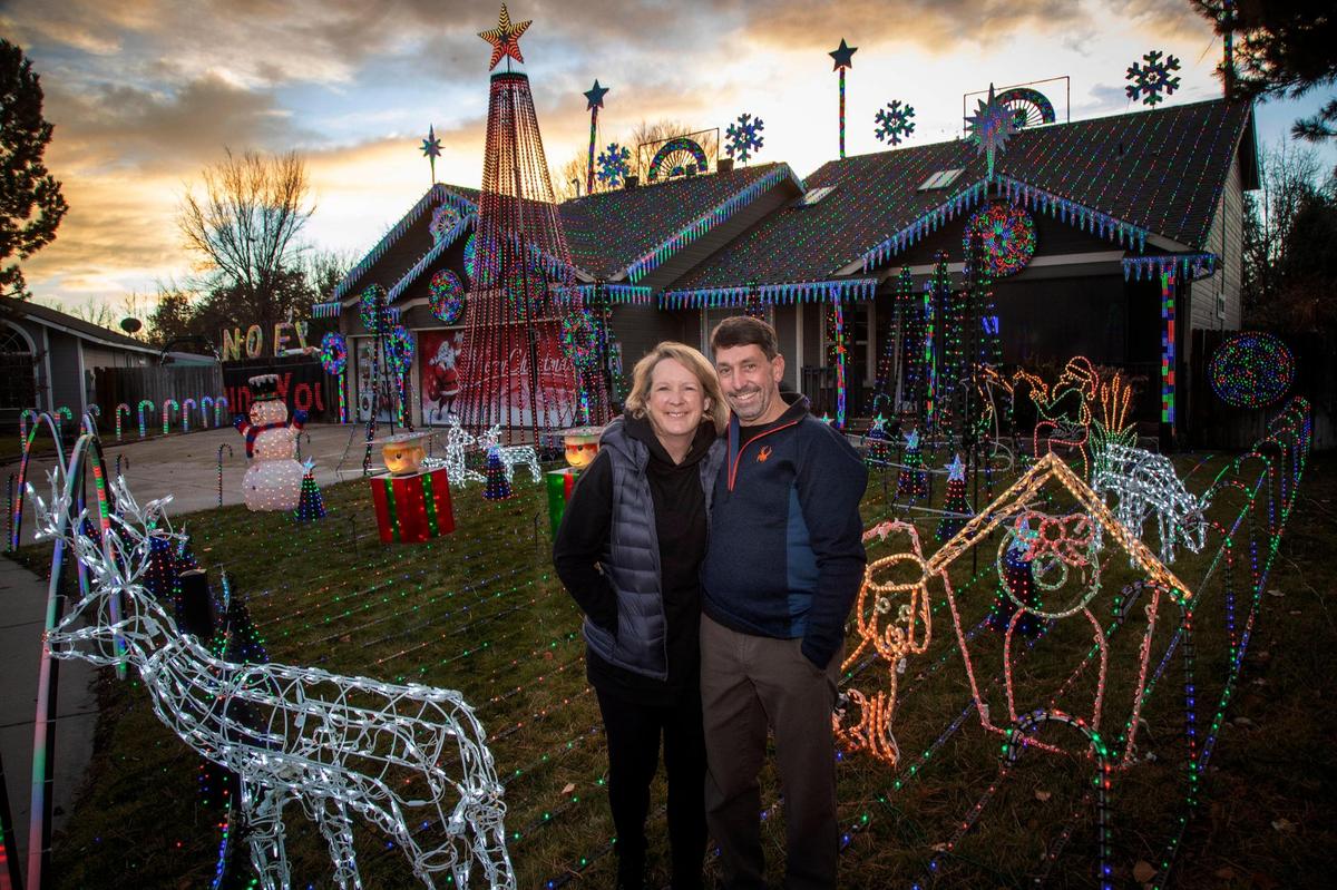 Roger and Sally DeBolt, shown in 2020, host a massive yearly Christmas light display – 60,000 nodes, he says – synced to music, which they use to solicit donations for the Make-A-Wish Foundation.