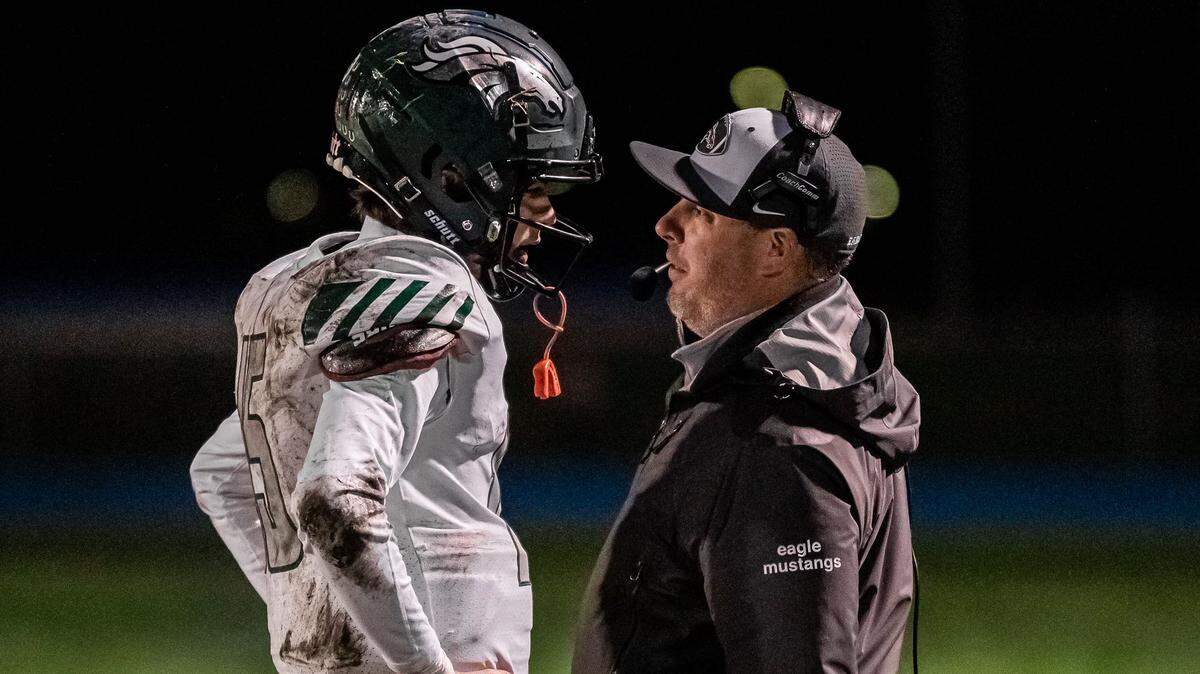 Eagle offensive coordinator James Cluphf, right, will become the Mustangs’ next head football coach.