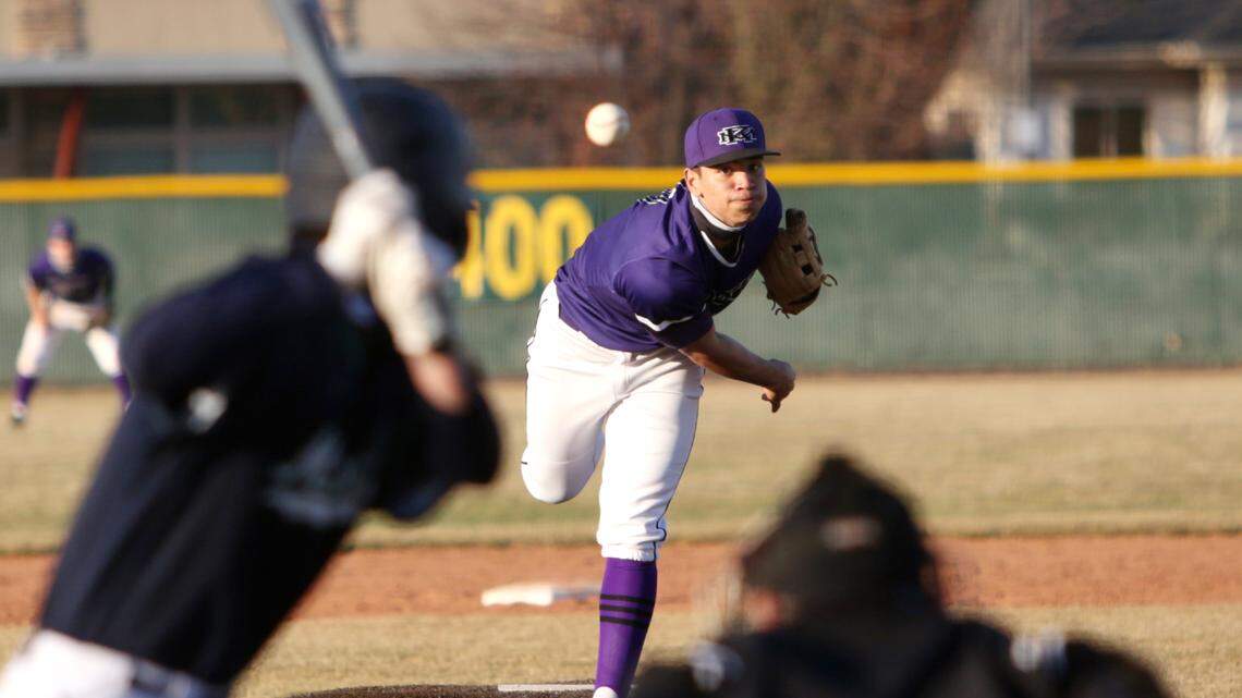 Rocky Mountain senior pitcher Jacob Hughes fires a pitch Tuesday at Mountain View High.
