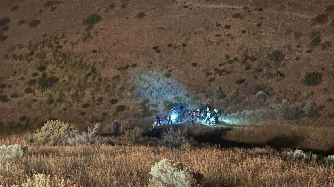 Boise Fire rescues two after rollover crash sends them 120 feet down a hill