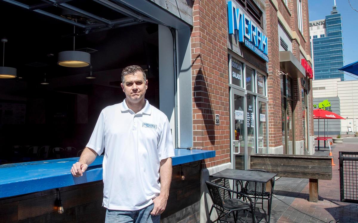 Aki Kalatzakis, co-owner of Meraki Greek Street Food in Downtown Boise, stands outside his restaurant in 2020. The restaurant had been approved for a $43,000 payroll protection loan through the coronavirus stimulus package approved by Congress.