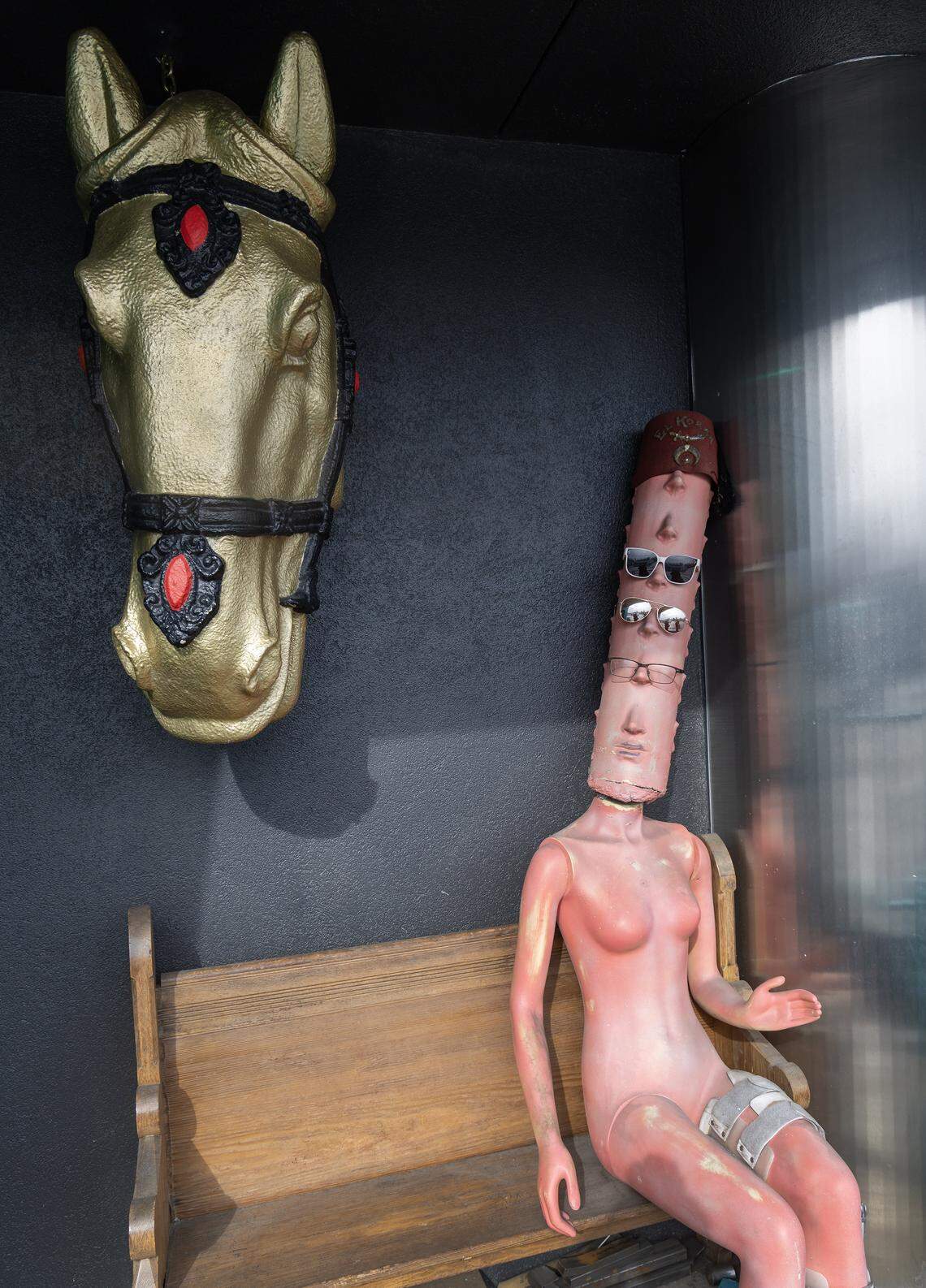 Born Weird Tattoo in Boise's Bench neighborhood houses a collection of weird items including a golden horse head from the former Boise P.F. Chang's decor.