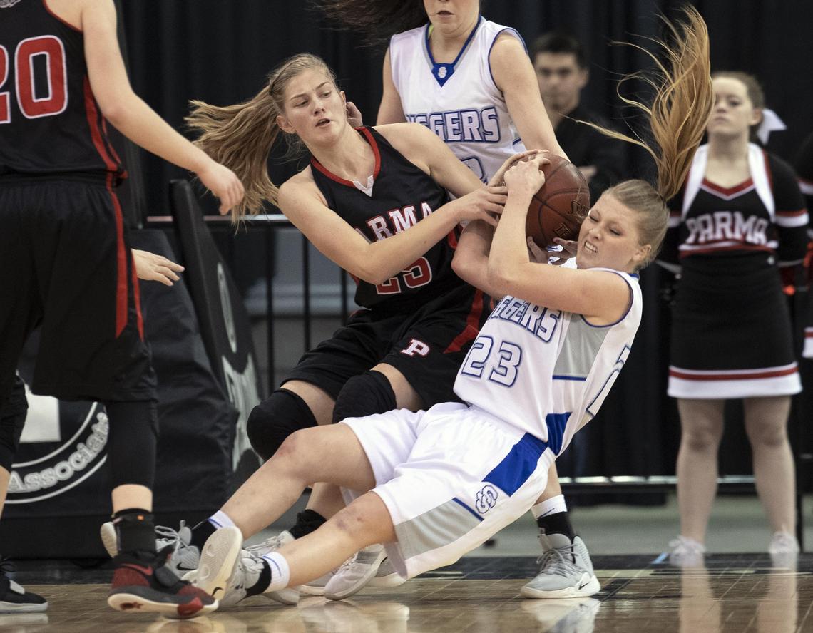 Parma’s Adyson Harris fights for a loose ball in the 3A state championship game last season at the Ford Idaho Center.