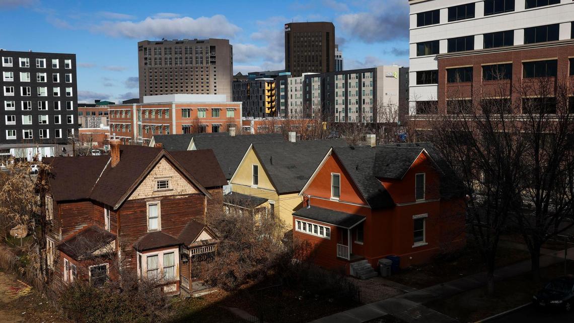 Surrounded by modern development and apartment buildings, a small cluster of homes built in the early 1900s still stand in Boise’s Central Addition. The series of homes along Broad Street are occupied, but the house on the left is vacant.