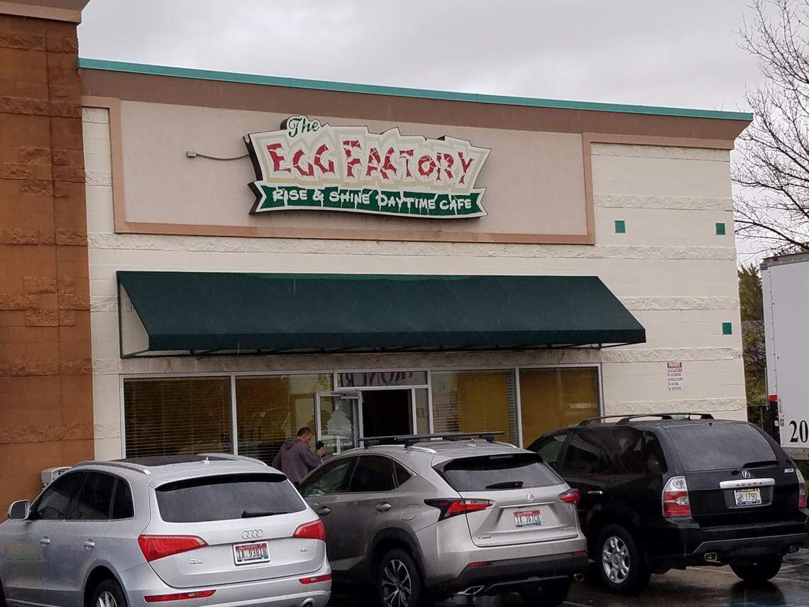 A worker moves restaurant equipment outside The Egg Factory on State Street after it closed in October.