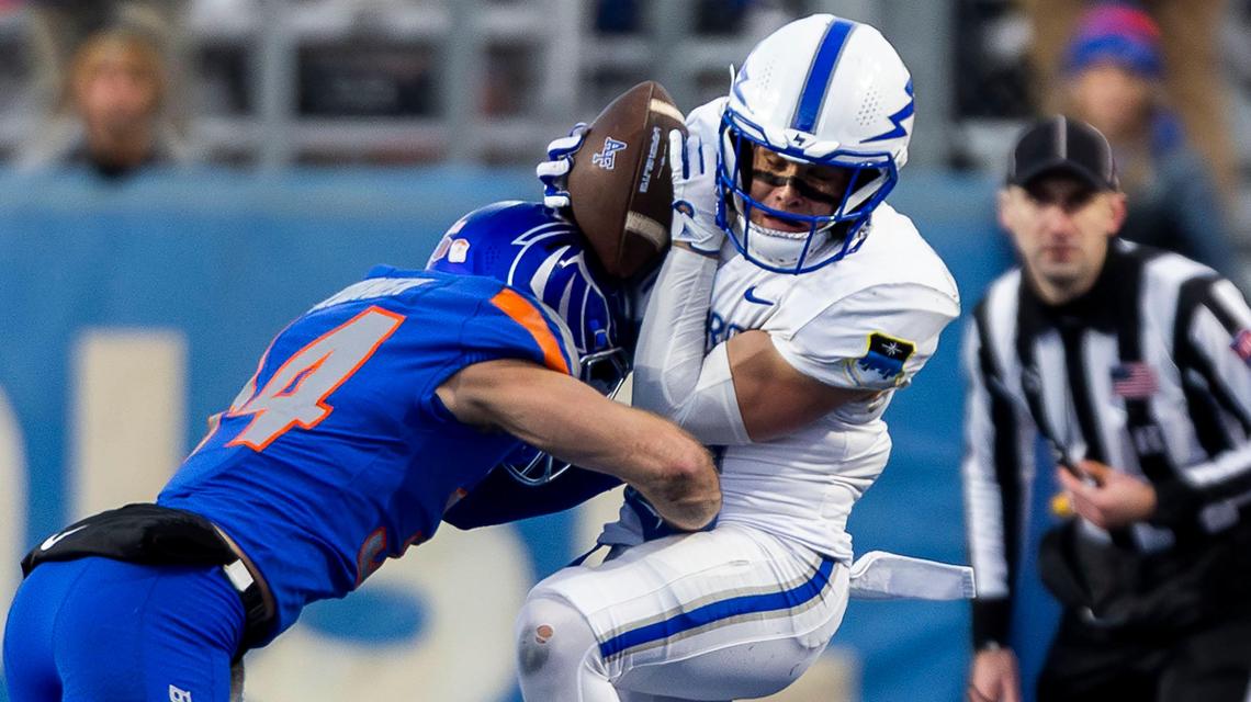 Boise State safety Alexander Teubner tackles Air Force wide receiver Cade Harris last season at Albertsons Stadium in Boise.