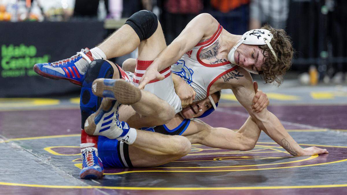 Nampa's Ryan Hirchert, top, and McQueen, Nevada's Cooper Sandoval, bottom, wrestle at the Rollie Lane Invitational, Saturday, Jan. 3, 2026. Sandoval won 4-1 in a decision. 