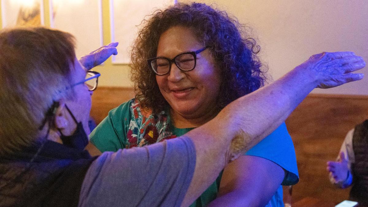Supporter Jo Banks, left, hugs Boise City Council District 3 candidate Lisa Sánchez during her election watch party at Cloud 9 Brewery on Tuesday.