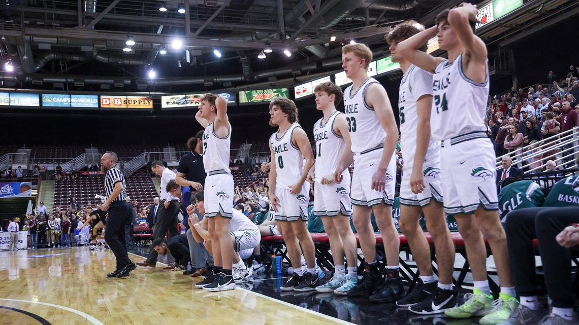 Eagle’s bench reacts to a missed shot at the buzzer that soured an exciting comeback against Rigby in the first round of the 5A boys basketball state tournament Thursday at the Ford Idaho Center in Nampa. Rigby won 54-52.