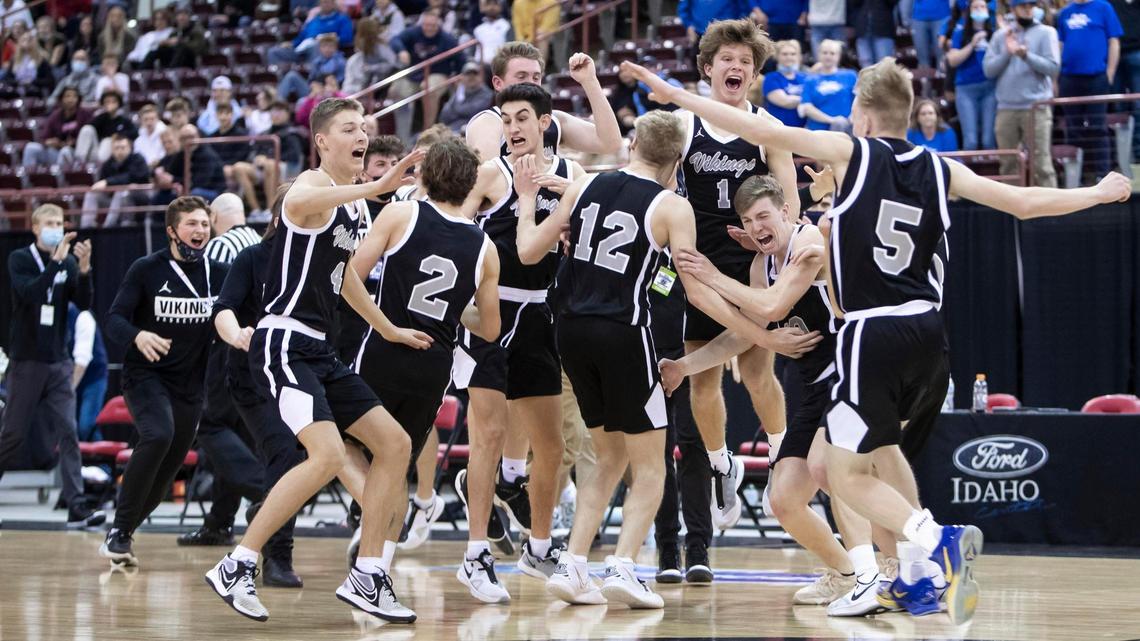 Middleton celebrates winning the 4A boys basketball state championship Saturday.