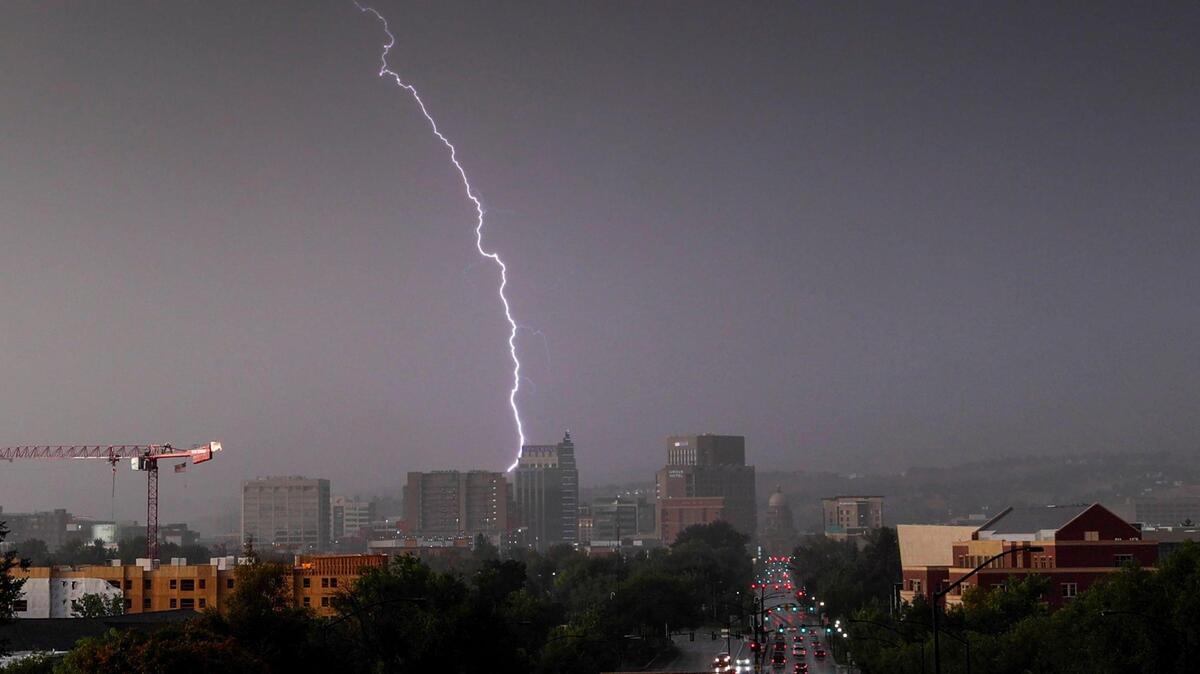 A bolt of lightning strikes over the downtown Boise skyline last year.