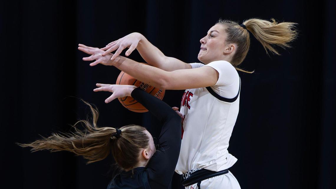 Boise senior Kaity Haan intercepts a pass to Rigby’s Bailey Barber during a 51-42 win over Rigby in the first round of the 6A girls basketball state tournament Thursday at the Ford Idaho Center in Nampa.