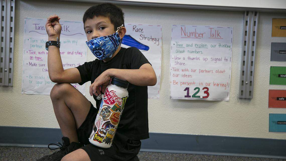 A second grader at Nampa’s Endeavor Elementary tells teacher Mysti Byrd he’s upset because he misses a family member. Part of Endeavor Elementary’s social-emotional protocol is a morning meeting where teachers check in with the students about how they feel at the start of the day.