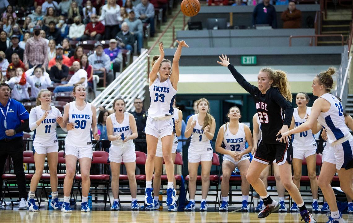 Timberline Lauren McCall hits the game-winning 3-pointer with 15 seconds in the Wolves’ 36-35 win over Boise in the 5A girls state basketball championship Saturday.