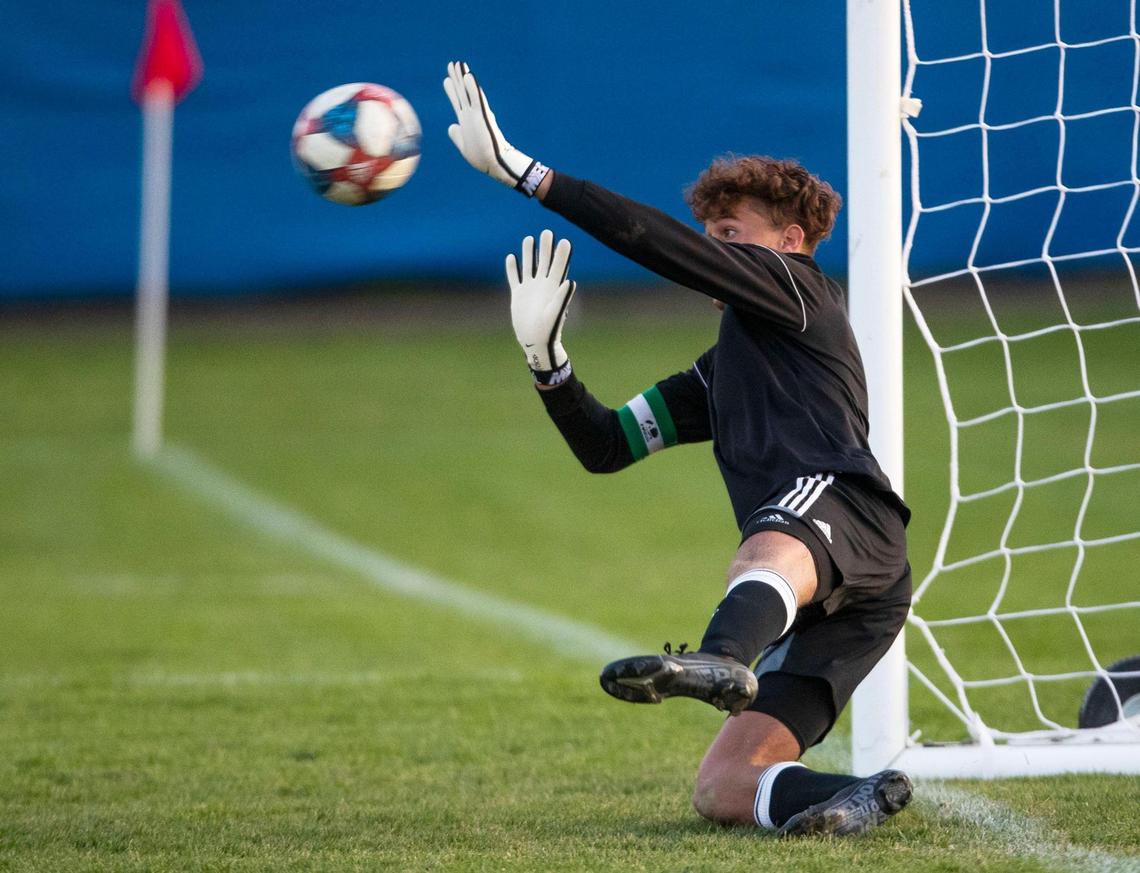 Rocky Mountain keeper Isaac Poole blocks an Eagle kick in the 5A District Three championship shootout Wednesday at Timberline. Rocky Mountain won 4-2 in penalties after a 1-1 tie.