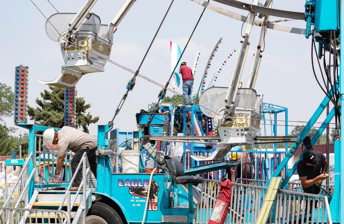 Workers set up a fair ride at the Western Idaho Fair on Wednesday. The fair will start on Friday, Aug. 20, and run through Aug. 29 at 5610 Glenwood St. in Garden City.