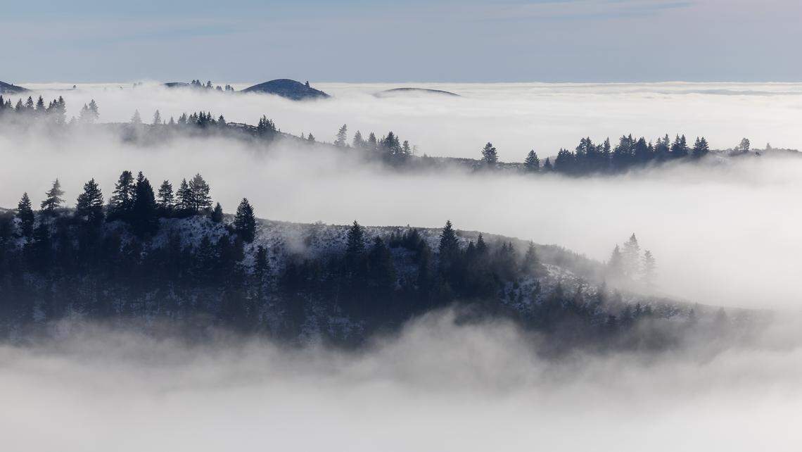 Clouds and fog settle into the valleys below the headwaters of Upper Dry Creek off Bogus Basin Road.