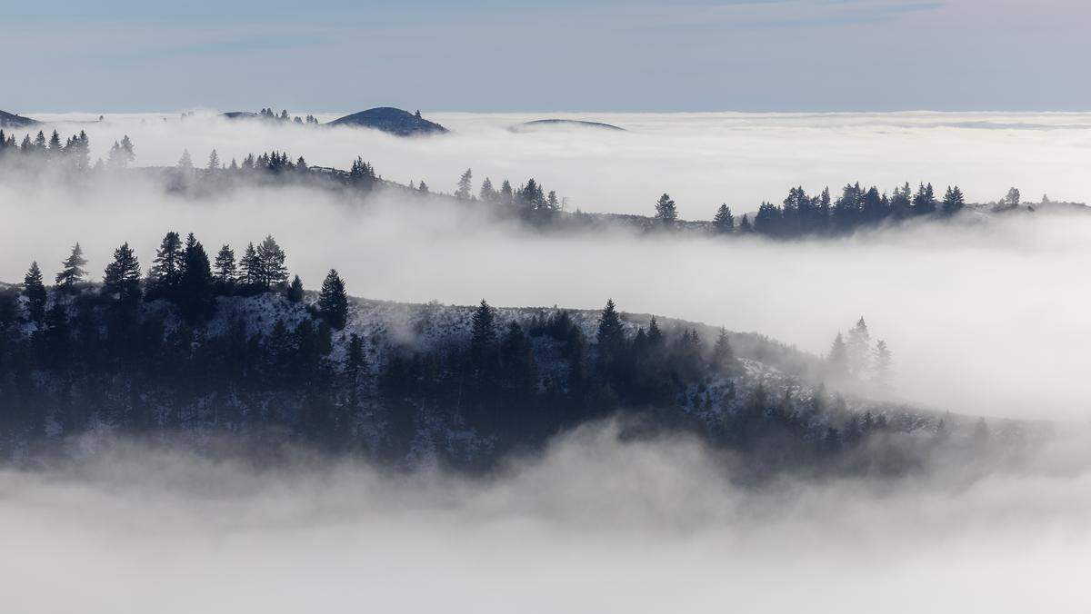 Clouds and fog settle into the valleys below the headwaters of Upper Dry Creek off Bogus Basin Road on Jan. 20.