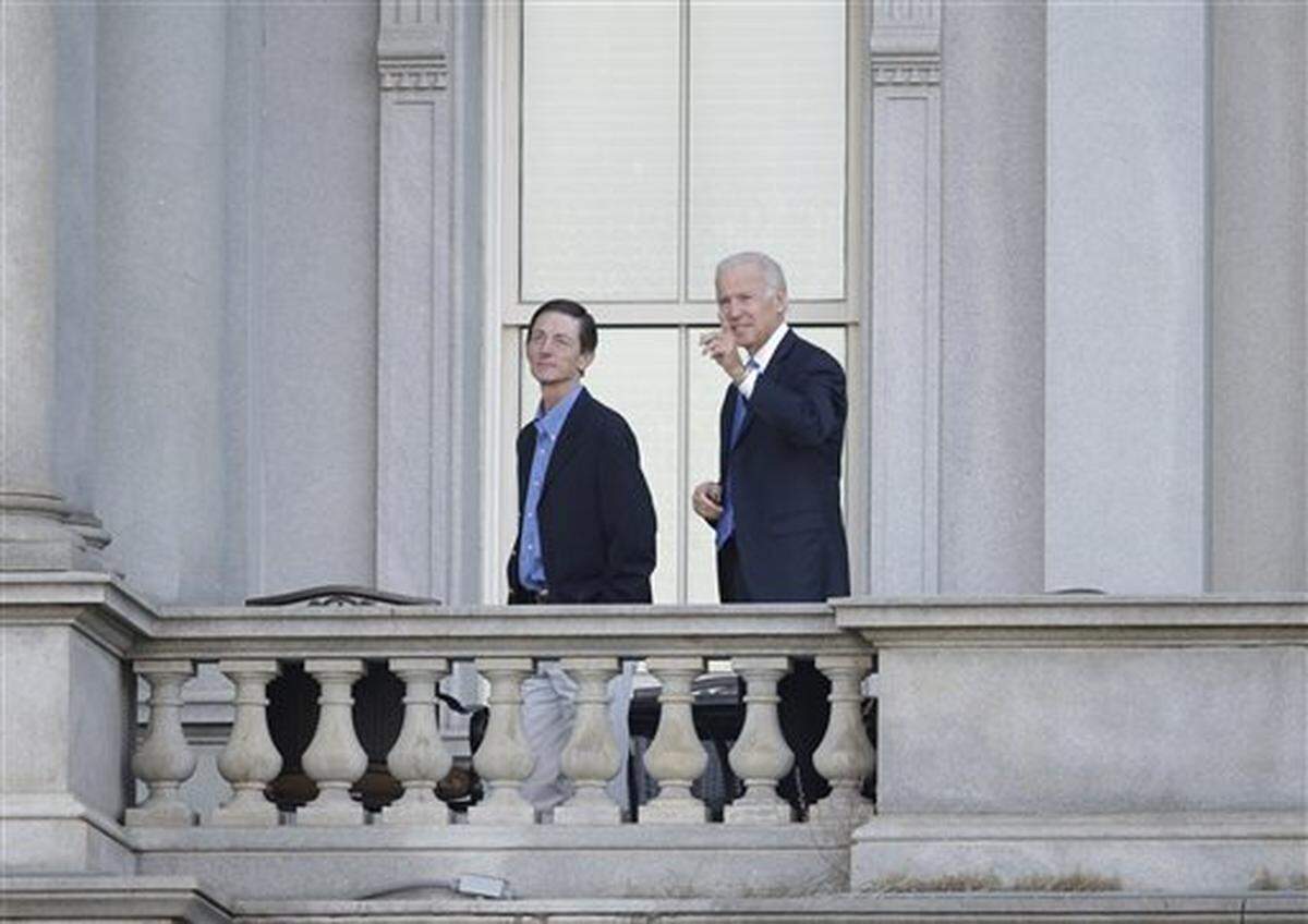 Then-Vice President Joe Biden, right, and his Chief of Staff Bruce Reed, left, in 2013 on a balcony of the Old Executive Office building on the White House complex in Washington.