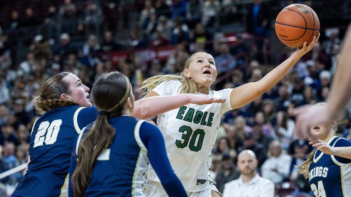 Eagle forward Berkley Jones scores in the paint against Middleton in the 6A girls basketball state championship game at Ford Idaho Center in Nampa, Saturday, Feb. 21, 2026.