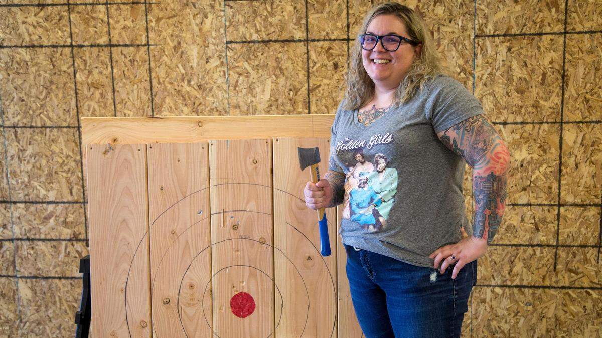 Ashley Brennan, 34, is establishing an ax-throwing venue — Section 37 Axe Room — in a shopping center at Overland and Five Mile. Axes are scheduled to begin flying Nov. 10 at the venue at 10535 W. Overland Road. Brennan and her fiance, Trever Lambert, had searched around for business ventures. “When we went to Denver and did the axes, we just knew,” she said.