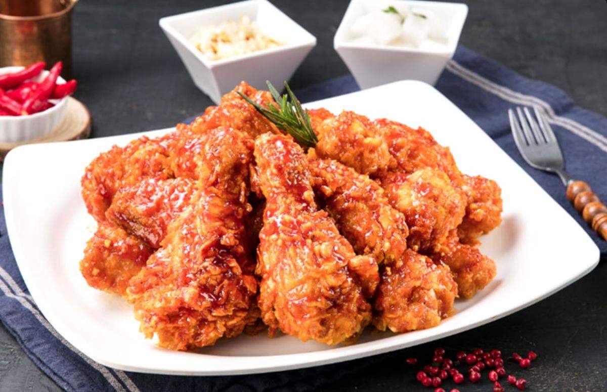 Crispy Yang-Nyeom Chicken (pronounced “yahng-nyum”) comes in mild and spicy varieties.