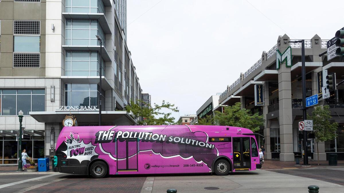 A near-silent electric bus embarks on a route from downtown Boise after stopping for passengers. Valley Regional Transit added eight more electric buses after being awarded a $17.4 million federal grant. But with limited operational funding, the Boise area will likely see some bus routes get cut this year.