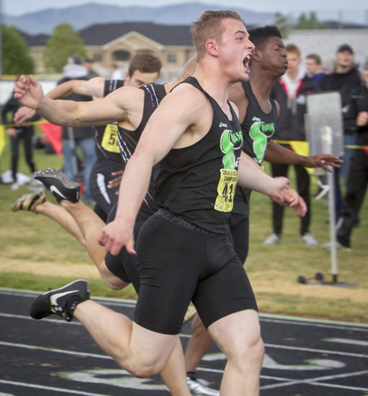 Mountain View's Magnus Hemingway, left, won the 5A district title in the 100 meters but finished second in the state finals by .04 seconds.