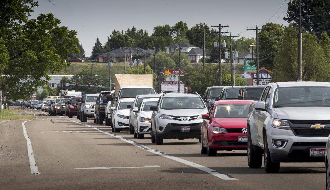 Commuters inch along Garden City’s Glenwood Street in bumper-to-bumper traffic. In 2018, voters in Ada County declined to raise their vehicle registration fees, which would have provided millions of dollars more every year for projects aimed at reducing traffic congestion.