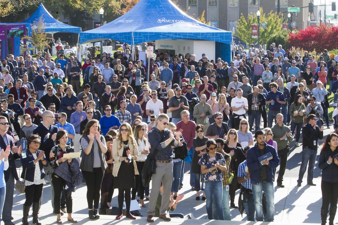 Celebrating Micron Technology Inc.’s 40th anniversary employees and residents of Boise celebrate near the Idaho Statehouse Thursday, Oct. 18, 2018 in Boise.