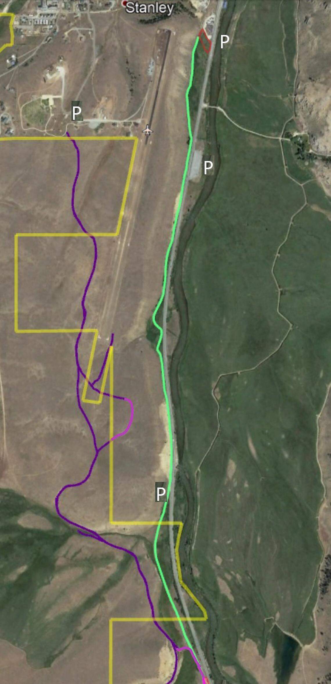 This map, courtesy of Dave Boren, shows the U.S. Forest Service’s proposed route for a trail from Stanley, at the top of the map, to Redfish Lake along the purple lines and crossing over different property lines in yellow. The green line down the middle of the map shows an alternative route proposed by Boren.