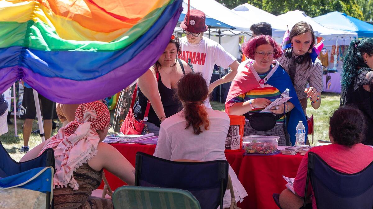 People check out vendor booths at Canyon County Pride at Lakeview Park.