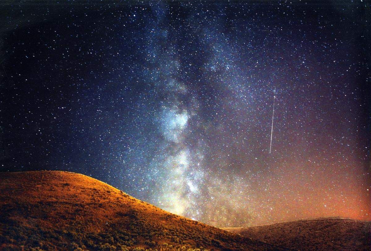 The Perseids meteor shower is visible over Lucky Peak Reservoir.