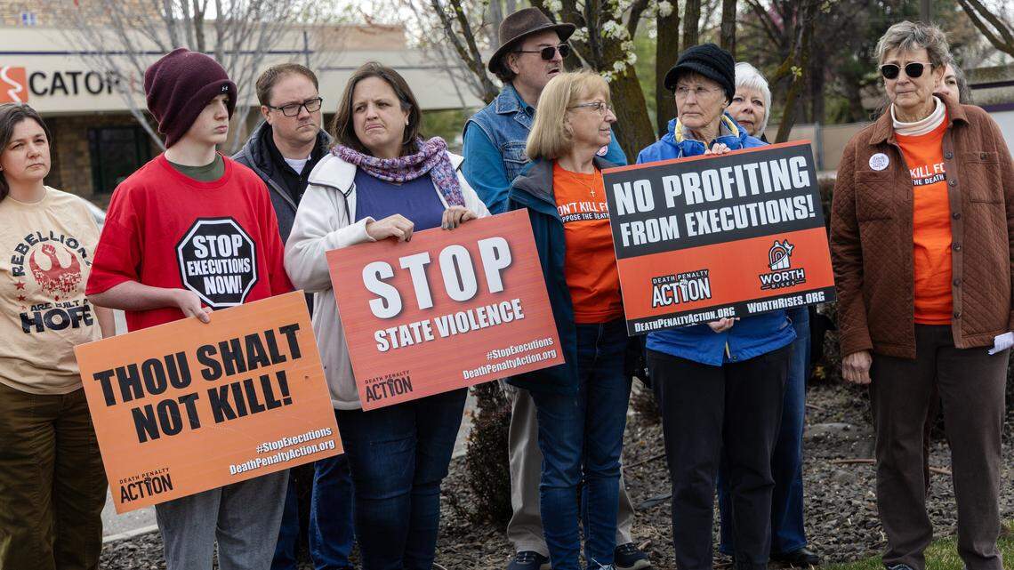 People demonstrate against the death penalty outside of Cator Ruma and Associates in March 2026 in Boise. Cator Ruma and Associates is a local engineering firm contracted to design Idaho’s new firing squad execution chamber.