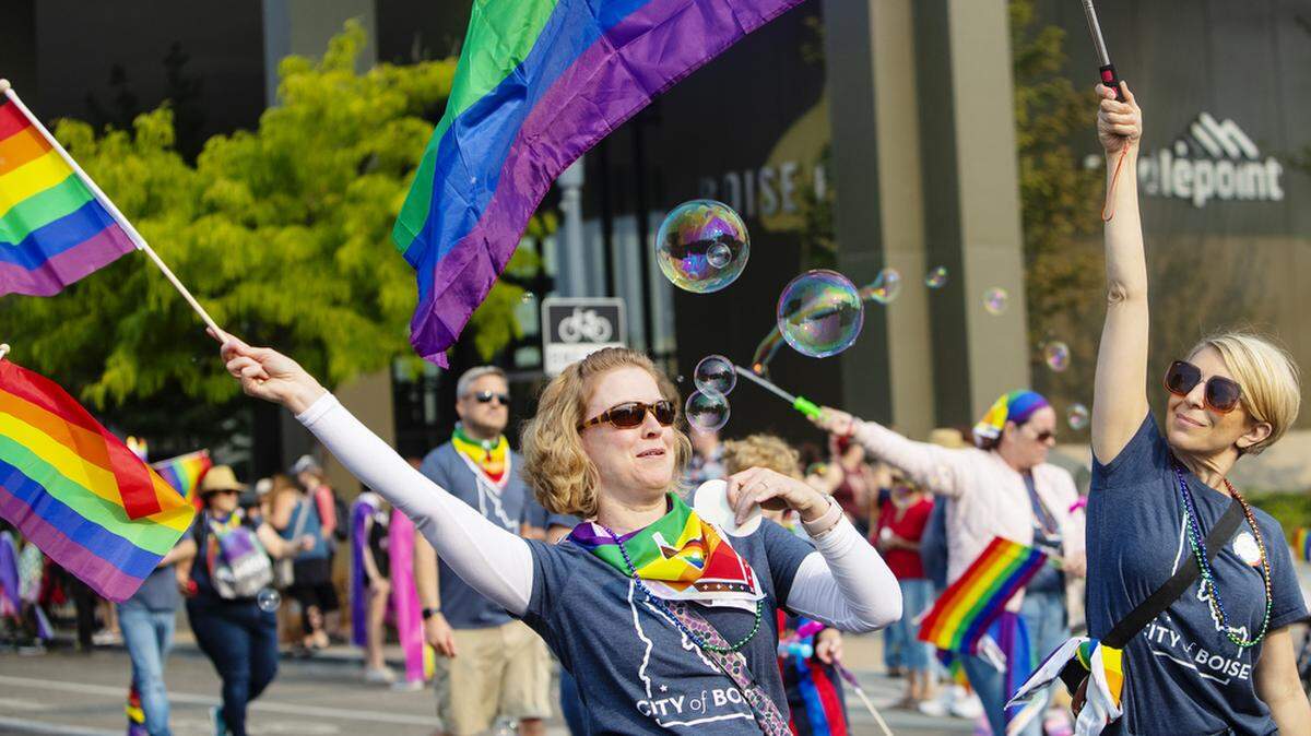 People participate in the parade for Boise Pride Festival in 2022.