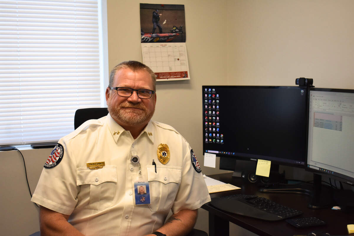 Payette County Paramedics EMS Chief Rick Funk sits in his office in Fruitland.