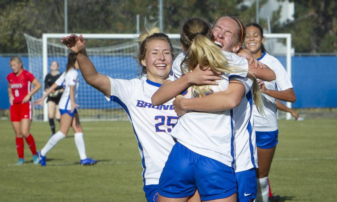 The Boise State women’s soccer team celebrates the Mountain West tournament championship Saturday, a 2-0 win against San Diego State.