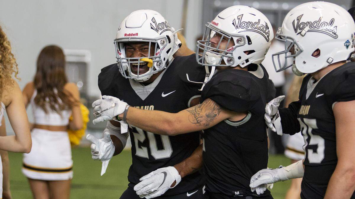 Senior defensive back Dorian Clark celebrates with teammates during Idaho’s 56-10 victory over Western New Mexico University on Sept. 8 in Moscow.