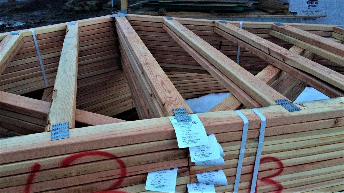 Boise homebuilders cannot keep up with demand for houses. Roof trusses are stacked at the site of a house under construction at 20th and Irene streets in Boise’s North End.