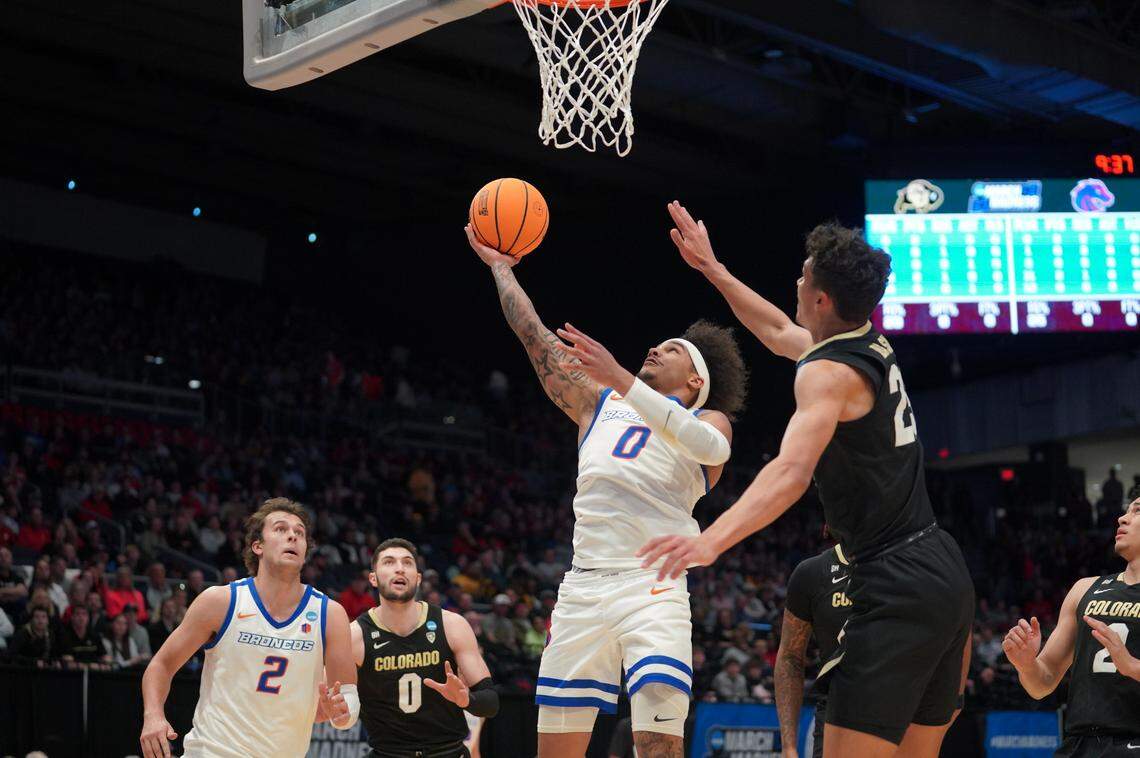 Boise State point guard Roddie Anderson III goes up for a layup Wednesday during the Broncos’ 60-53 loss in the First Four of the NCAA Tournament in Dayton, Ohio. Anderson finished with 14 points.
