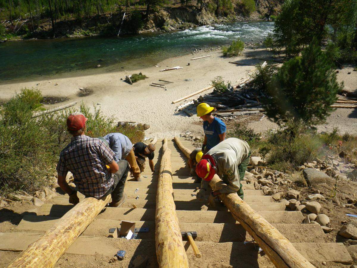 Volunteers work to rebuild the Indian Creek boat ramp during a trail maintenance project through the Selway-Bitterroot Frank Church Foundation. Volunteers with the organization help keep wilderness trails open and accessible as the Forest Service continues to see its funding cut.