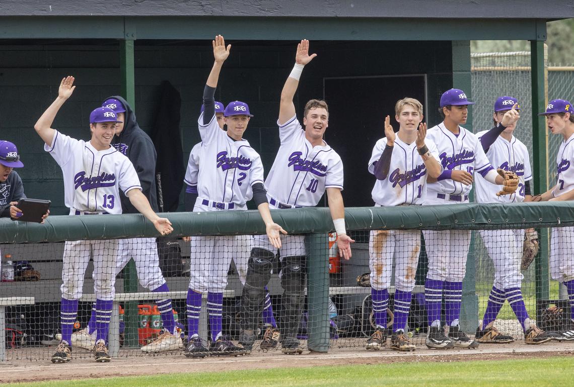 The Rocky bench cheers a single by Conor Christiansen that scored two runs and gave the Grizzlies a 9-0 lead in the bottom of the fourth inning. Rocky Mountain beat Boise 10-0 in five innings in the first round of the 5A state baseball tournament at Capital High on Thursday, May 16, 2019.