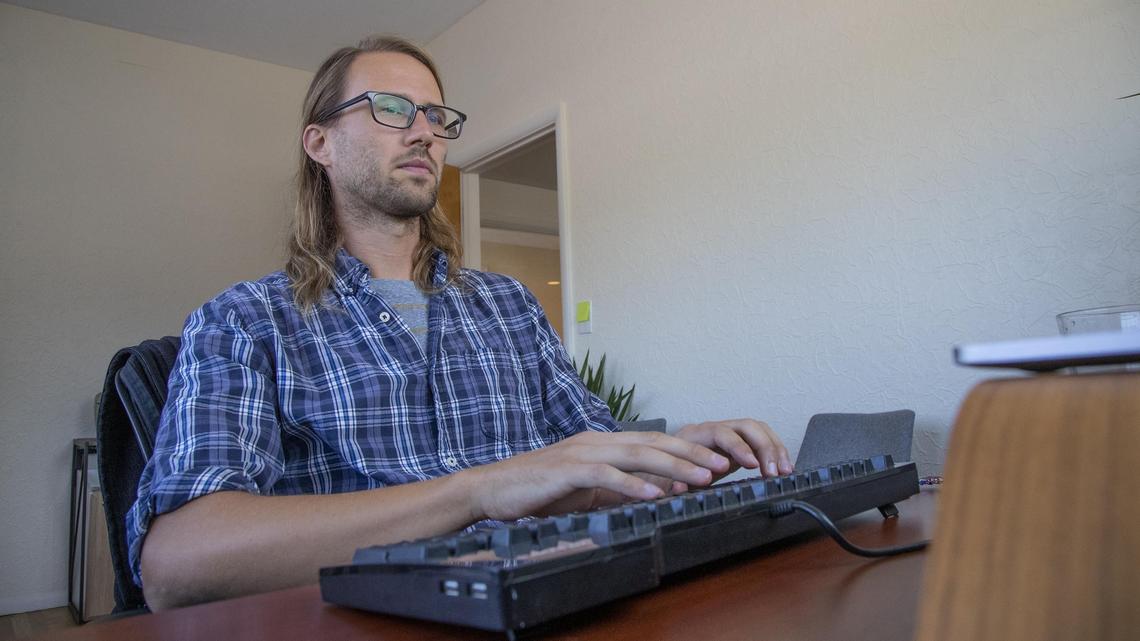 Matt Dalley, cofounder of Simply Eloped, works in his Boise office where the staff helps plan wedding ceremonies for couples looking for something more than exchanging vows before a courtroom judge, and less expensive than a full-scale wedding ceremony with a hundred guests.