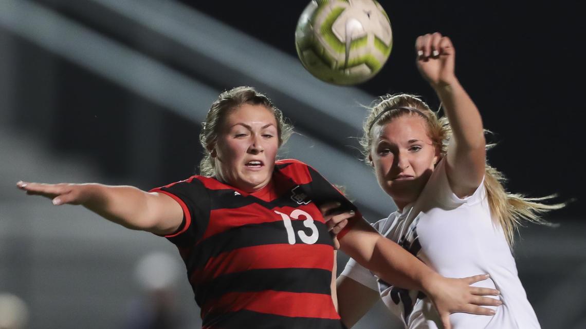 Boise senior Kenzie Kluksdal defends against Rocky Mountain’s Mylee Carver in the 5A District Three girls soccer championship Wednesday, Oct. 16, 2019 at Rocky Mountain High School in Meridian.