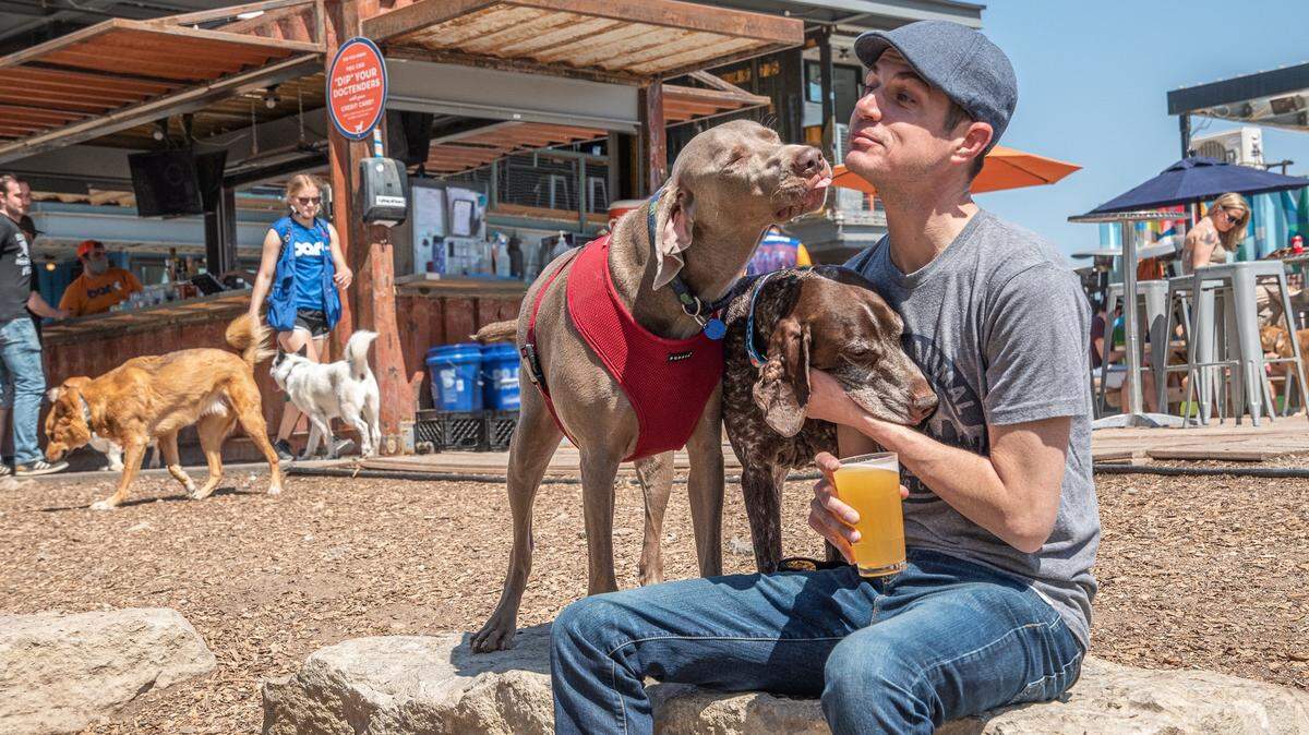 Bars with dog parks have taken off in other parts of the United States. Headquartered in Kansas City, Bar K says that each of its locations “features a bar, restaurant, event space and multiple spacious dog parks for both large and small dogs — all supervised by trained Bar K Dogtenders.”