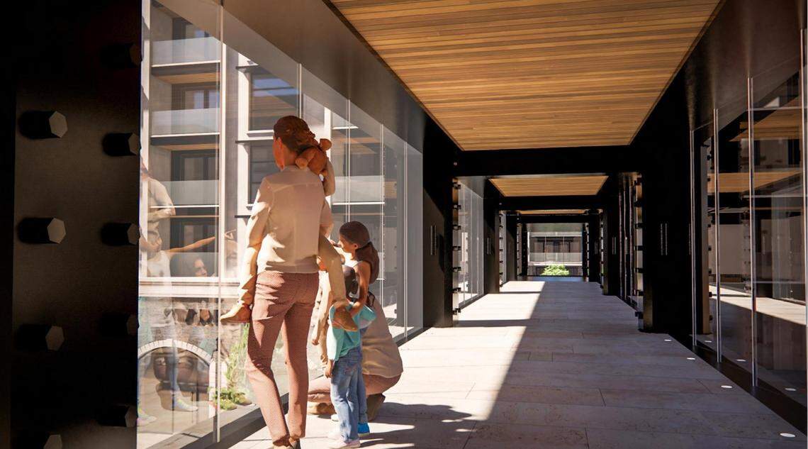 The Bridge at the Village would be connected to the Village with a bridge as shown in this rendering.