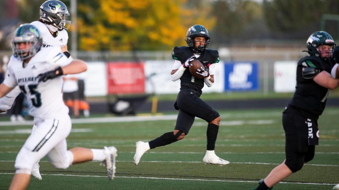 Eagle senior Ian Duarte catches a pass on the Mustangs’ first play against Mountain View and scores on an 85-yard touchdown Friday at Eagle High School. On the Mustangs’ second play from scrimmage, Duarte scored on a 55-yard touchdown run.