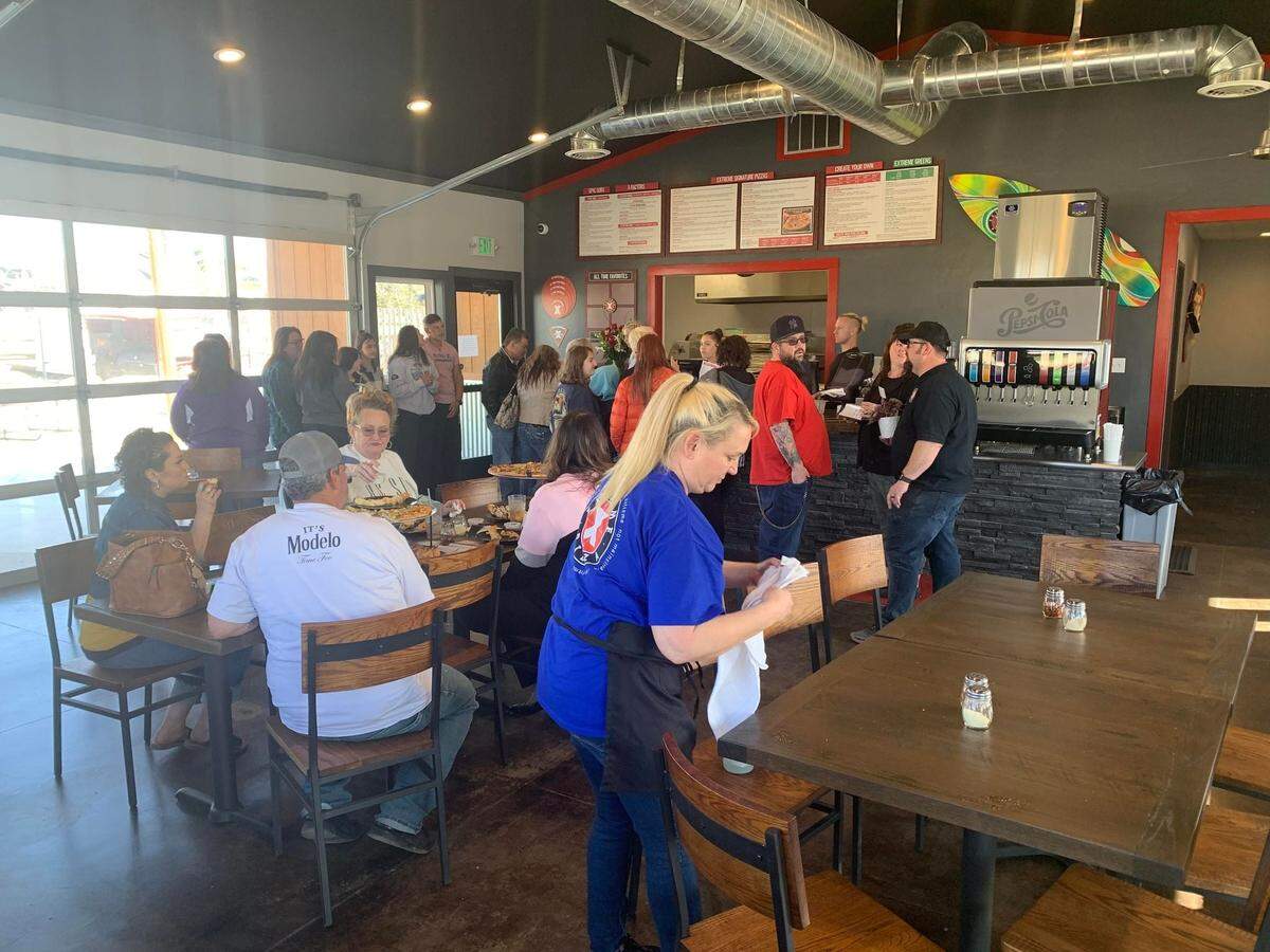Customers eat at at the new restaurant, which was opened in a former barbecue building.