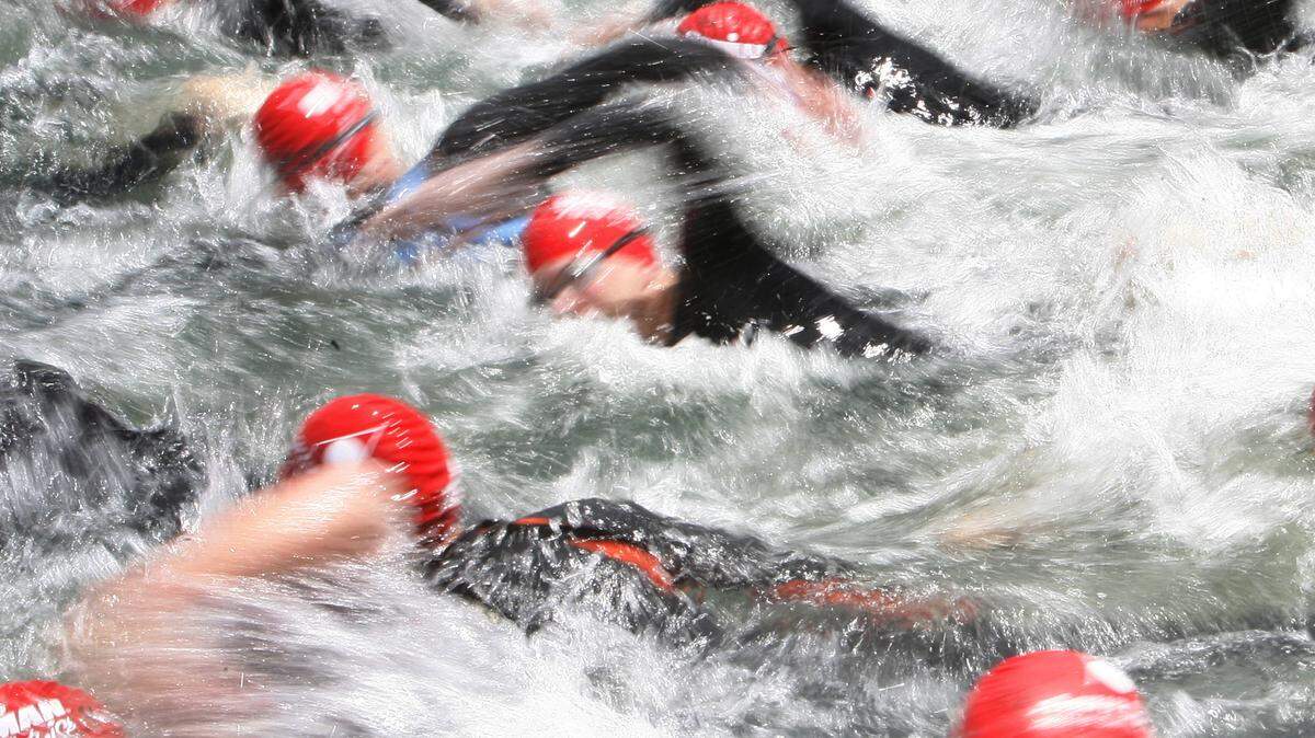 2001: Men ages 30-34 start the 1.2-mile swim in Lucky Peak Reservoir, the start of the Ironman 70.3 Boise triathlon.
