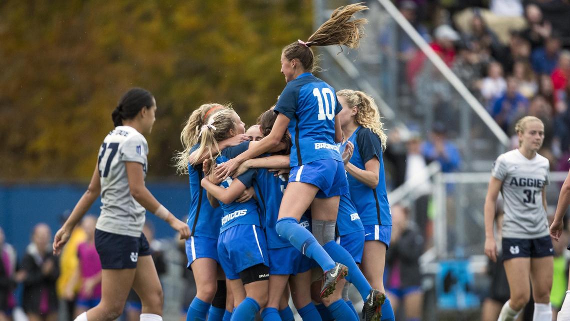 The Boise State women’s soccer team celebrates a game-tying goal by Raimee Sherle against Utah State on Oct. 26, 2018, at the Boas Soccer Complex in Boise.
